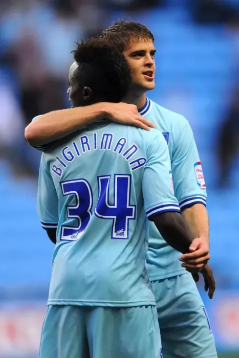 Framed Print : Coventry City FC: Gael Bigirimana and Martin Cranie Celebrate Championship Victory over Derby County (10-09-2011) Framed Print : Coventry City FC: Gael Bigirimana and Martin Cranie Celebrate Championship Victory over Derby County (10-09-2011)