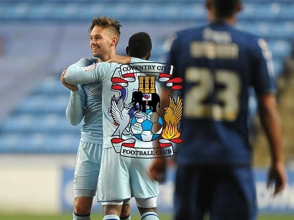 Coventry City FC: James Bailey and Franck Moussa Celebrate Promotion-Clinching Victory over Oldham in npower League One