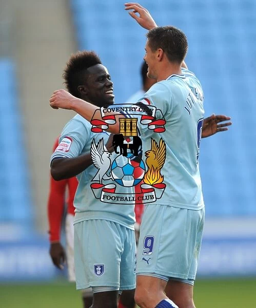 Coventry City FC: Lukas Jutkiewicz and Gael Bigirimana Celebrate Championship Victory over Nottingham Forest at Ricoh Arena