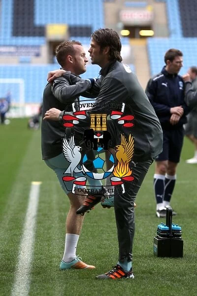 Coventry City FC: Sammy Clingan and Hermann Hreidarsson Stretching During Warm-Up at Ricoh Arena (Npower Championship, 21-01-2012)