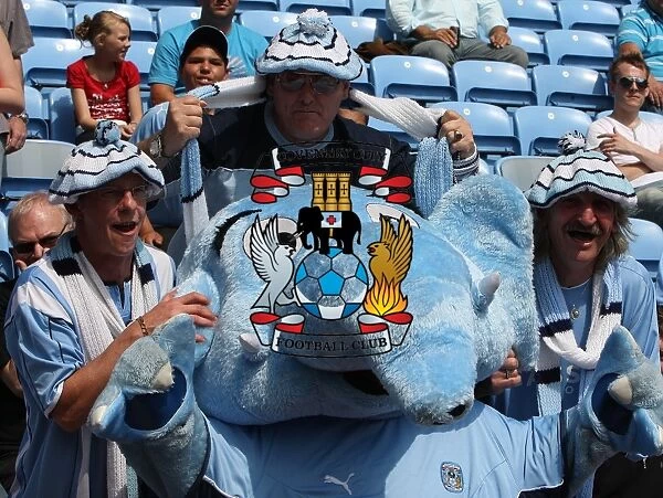 Coventry City FC: Sky Blue Sam and Fans Celebrate at Ricoh Arena during Coventry City vs Ipswich Town in Championship (09-08-2009)