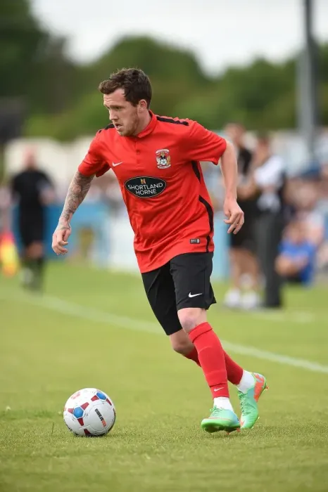 Framed Print : Coventry City FC vs Nuneaton Town: Danny Swanson in Pre-Season Action at Liberty Way