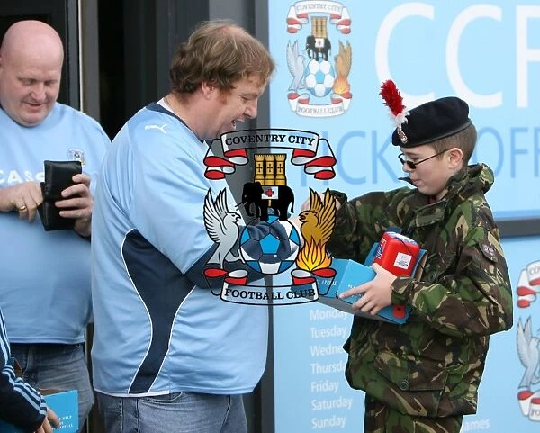 Coventry City FC vs Reading in the Championship: Fans Honor Remembrance Day with Poppies at Ricoh Arena