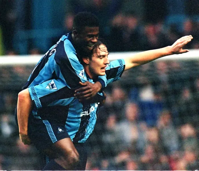 Framed Print : Coventry City FC's Historic Upset: Noel Whelan and George Boateng Celebrate Goal Against Manchester United (FA Carling Premiership, 1997) Framed Print : Coventry City FC's Historic Upset: Noel Whelan and George Boateng Celebrate Goal Against Manchester United (FA Carling Premiership, 1997)