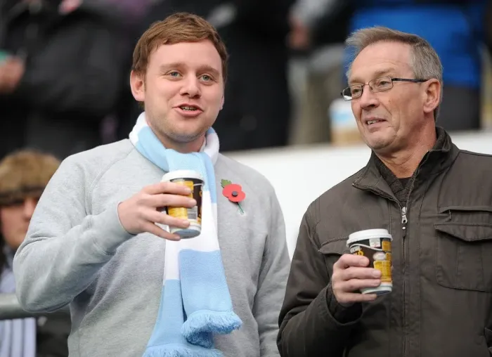 Framed Print : Coventry City Football Club: A Cozy Npower Championship Moment - Fans Savoring Hot Drinks at Ricoh Arena Framed Print : Coventry City Football Club: A Cozy Npower Championship Moment - Fans Savoring Hot Drinks at Ricoh Arena