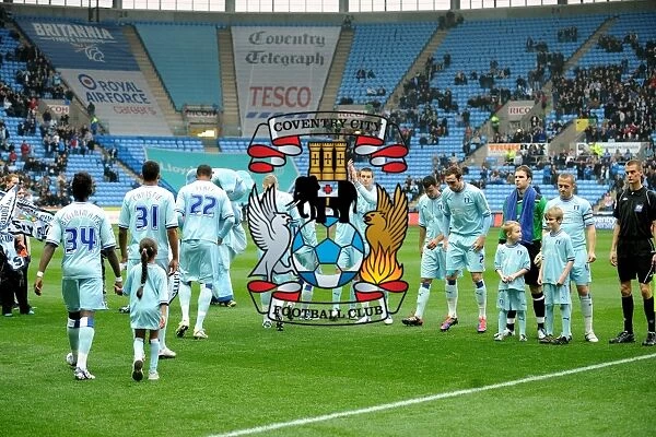 Coventry City players take to the field for the match