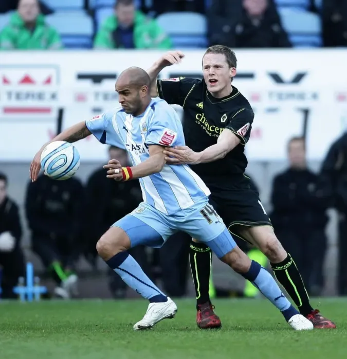 Framed Print : Coventry City vs. Wolverhampton Wanderers: Leon McKenzie Slips Past Christophe Berra in Coca-Cola Championship Clash at Ricoh Arena Framed Print : Coventry City vs. Wolverhampton Wanderers: Leon McKenzie Slips Past Christophe Berra in Coca-Cola Championship Clash at Ricoh Arena