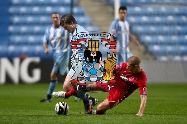Coventry City vs Aldershot Town: A Battle for the Ball in the Carling Cup (August 13, 2008)