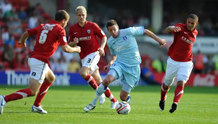 Framed Print : Coventry City vs Barnsley: Lucas Jutkiewicz Faces Off Against Stephen Foster and Nathan Doyle at Oakwell Stadium, Npower Football League Championship (1st October 2011) Framed Print : Coventry City vs Barnsley: Lucas Jutkiewicz Faces Off Against Stephen Foster and Nathan Doyle at Oakwell Stadium, Npower Football League Championship (1st October 2011)