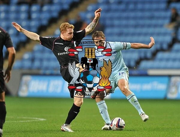 Coventry City vs Birmingham City: A Battle for the Ball - Capital One Cup Rivalry