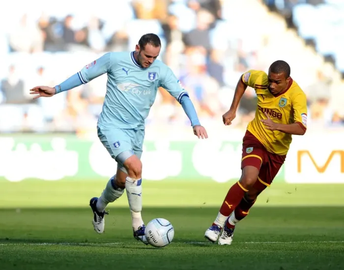 Framed Print : Coventry City vs Burnley: Clash at the Ricoh Arena - David Bell vs Junior Stanislas (Npower Football League Championship, 2011) Framed Print : Coventry City vs Burnley: Clash at the Ricoh Arena - David Bell vs Junior Stanislas (Npower Football League Championship, 2011)