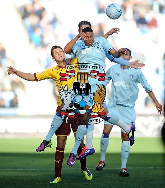 Coventry City vs Burnley: Cyrus Christie Wins a Header in Npower Championship Match at Ricoh Arena (2011)