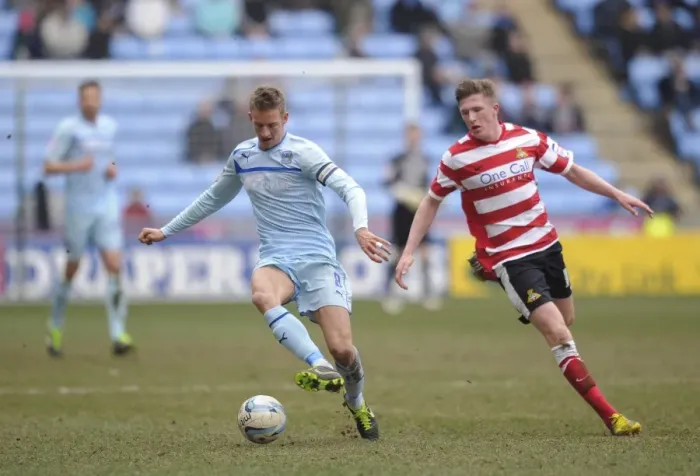 Framed Print : Coventry City vs Doncaster Rovers: A Battle in Npower Football League One - Carl Baker vs John Lundstram at Ricoh Arena