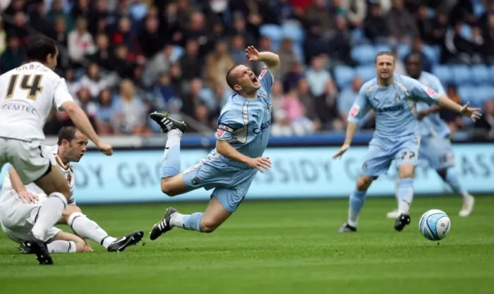 Framed Print : Coventry City vs. Hull City: Championship Clash – Michael Doyle Tripped by Damien Delaney (2007) Framed Print : Coventry City vs. Hull City: Championship Clash – Michael Doyle Tripped by Damien Delaney (2007)