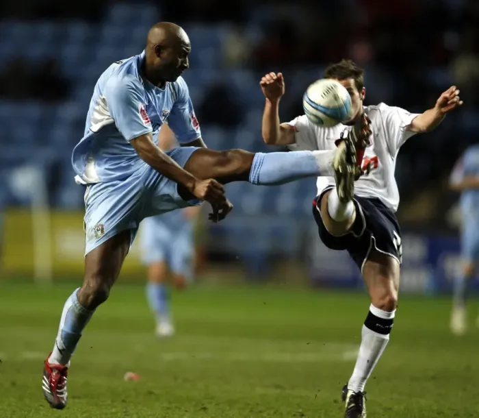 Framed Print : Coventry City vs Ipswich Town: Dele Adebola Battles for the Ball in Coca-Cola Championship Match at The Ricoh Arena (2007) Framed Print : Coventry City vs Ipswich Town: Dele Adebola Battles for the Ball in Coca-Cola Championship Match at The Ricoh Arena (2007)