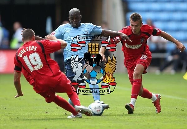 Coventry City vs Ipswich Town: Intense Battle for the Ball in the Championship