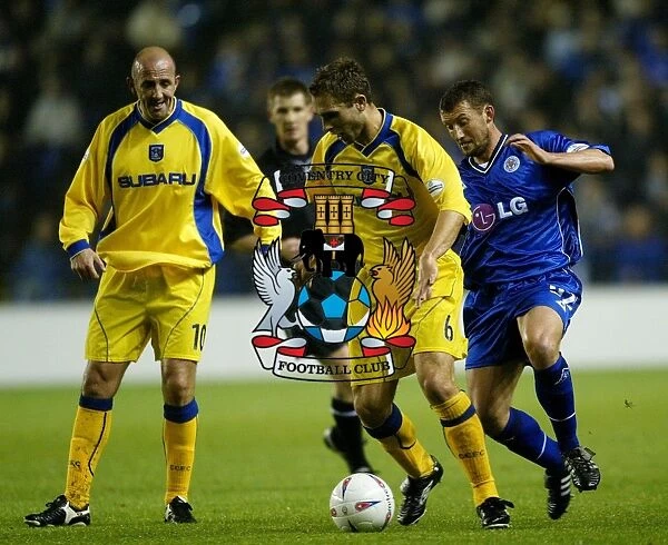 Coventry City vs Leicester City: Eustace Defends Against McKinlay in Intense Division One Clash (2002)
