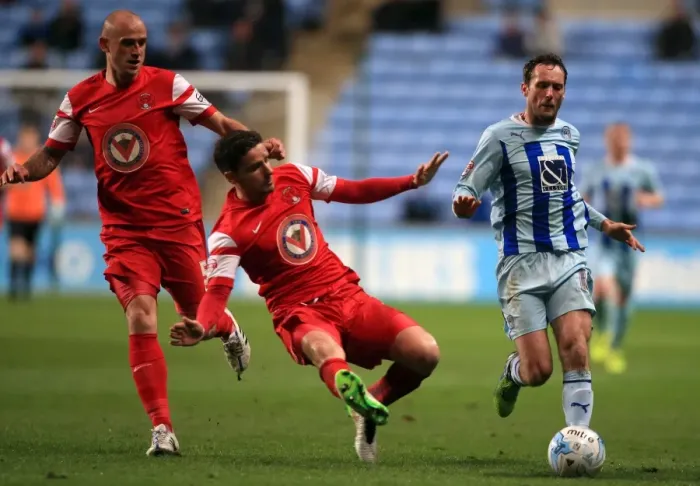 Framed Print : Coventry City vs Leyton Orient: A Tense Clash at Ricoh Arena - Jim O'Brien vs Mathieu Baudry and Scott Cuthbert Framed Print : Coventry City vs Leyton Orient: A Tense Clash at Ricoh Arena - Jim O'Brien vs Mathieu Baudry and Scott Cuthbert