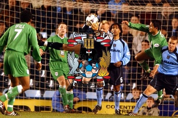 Coventry City vs Millwall: Magnus Hedman Claims the Ball in Nationwide League Division One (April 12, 2002)