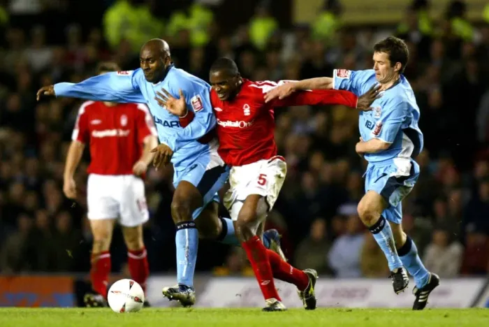 Framed Print : Coventry City vs Nottingham Forest: A Closer Look - Dele Adebola and Michael Doyle Pressuring Darryl Powell (Championship, 2005) Framed Print : Coventry City vs Nottingham Forest: A Closer Look - Dele Adebola and Michael Doyle Pressuring Darryl Powell (Championship, 2005)