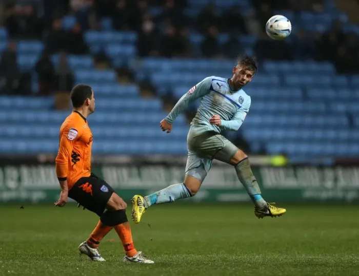 Framed Print : Coventry City vs Portsmouth: James Bailey vs Darel Russell - Npower League One Rivalry at Ricoh Arena