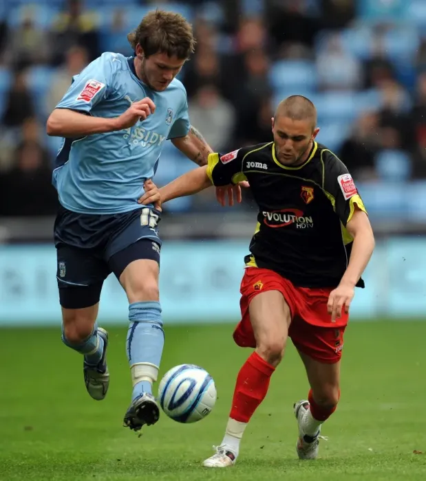 Framed Print : Coventry City vs Watford: Intense Battle for the Ball in the Championship - Aron Gunnarsson vs Henri Lansbury (Ricoh Arena, 02-05-2010) Framed Print : Coventry City vs Watford: Intense Battle for the Ball in the Championship - Aron Gunnarsson vs Henri Lansbury (Ricoh Arena, 02-05-2010)
