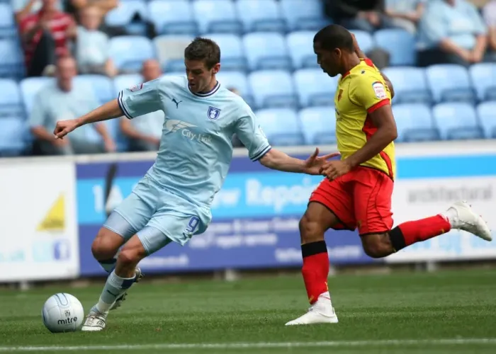 Framed Print : Coventry City vs. Watford: Clash between Jutkiewicz and Mariappa in the Npower Championship (20-08-2011, Ricoh Arena)