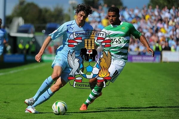 Coventry City vs Yeovil Town: Barton Outmaneuvers Reid in Npower League One Clash at Huish Park
