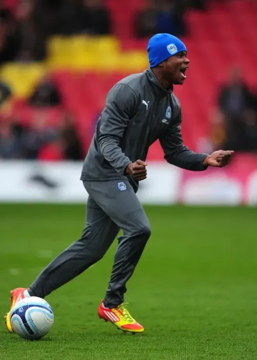 Framed Print : Coventry City's Alex Nimely: Uncontainable Excitement During Warm-Up Ahead of Watford Clash (Npower Championship, 17-03-2012) Framed Print : Coventry City's Alex Nimely: Uncontainable Excitement During Warm-Up Ahead of Watford Clash (Npower Championship, 17-03-2012)