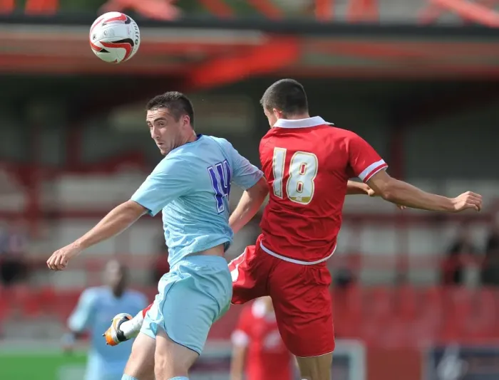 Framed Print : Coventry City's Callum Ball Soars Over Accrington Stanley's Tom Eckersley (Pre-Season Friendly) Framed Print : Coventry City's Callum Ball Soars Over Accrington Stanley's Tom Eckersley (Pre-Season Friendly)
