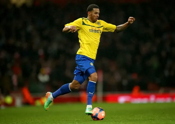 Framed Print : Coventry City's Cyrus Christie Takes on Arsenal at Emirates Stadium in FA Cup Round 4 (2014) Framed Print : Coventry City's Cyrus Christie Takes on Arsenal at Emirates Stadium in FA Cup Round 4 (2014)