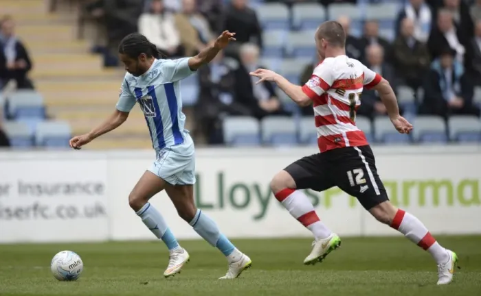 Framed Print : Coventry Citys Dominic Samuel scores the opening goal against Doncaster Rovers Framed Print : Coventry Citys Dominic Samuel scores the opening goal against Doncaster Rovers