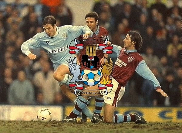 Coventry City's Eion Jess Pulls Away from West Ham United's Ian Bishop