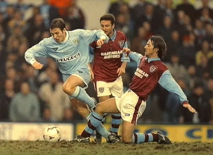 : Coventry City's Eion Jess Pulls Away from West Ham United's Ian Bishop : Coventry City's Eion Jess Pulls Away from West Ham United's Ian Bishop