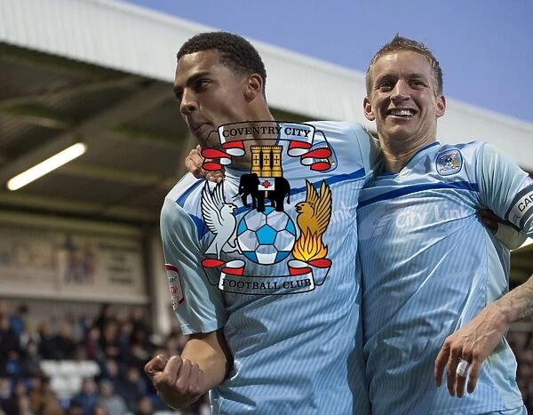 Coventry City's Glory: Franck Moussa and Carl Baker's Euphoric Celebration after Scoring the Third Goal vs Hartlepool United in Football League One
