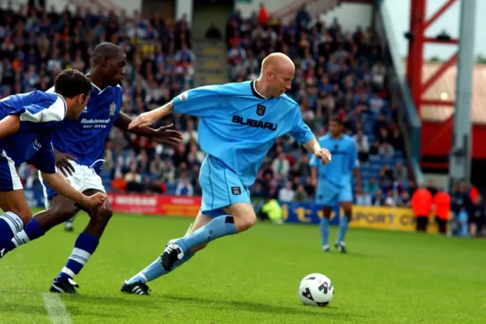 Framed Print : Coventry City's Lee Hughes: Fending Off Stockport Defenders Amidst Division One Momentum (11-08-2001) Framed Print : Coventry City's Lee Hughes: Fending Off Stockport Defenders Amidst Division One Momentum (11-08-2001)