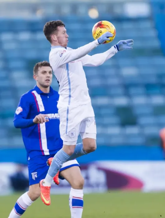 Framed Print : Danny Swanson vs Doug Loft: A Battle in the League One Clash at Priestfield Stadium Framed Print : Danny Swanson vs Doug Loft: A Battle in the League One Clash at Priestfield Stadium
