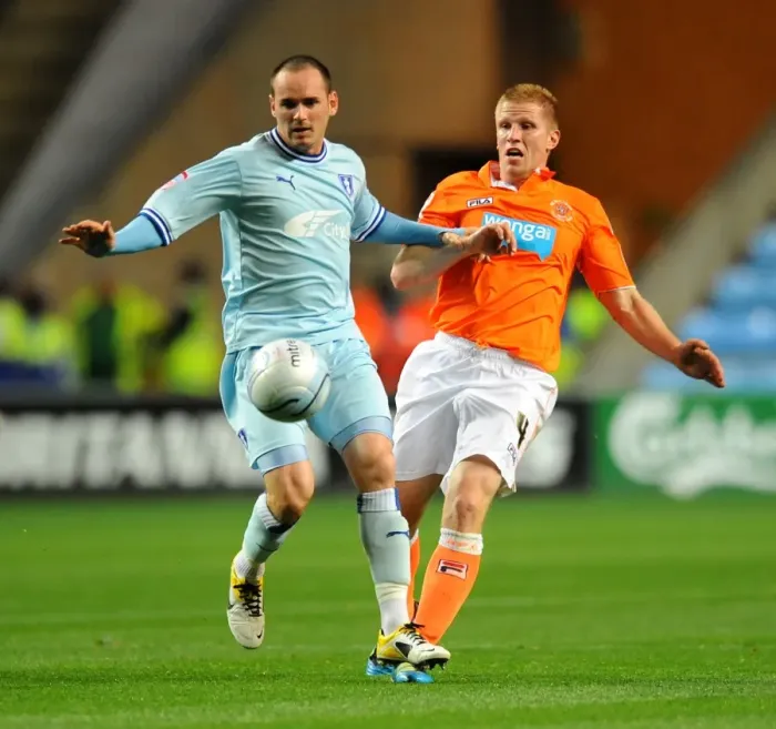Framed Print : David Bell vs Keith Southern: Intense Battle for Control in Coventry City vs Blackpool Championship Clash (September 27, 2011, Ricoh Arena) Framed Print : David Bell vs Keith Southern: Intense Battle for Control in Coventry City vs Blackpool Championship Clash (September 27, 2011, Ricoh Arena)