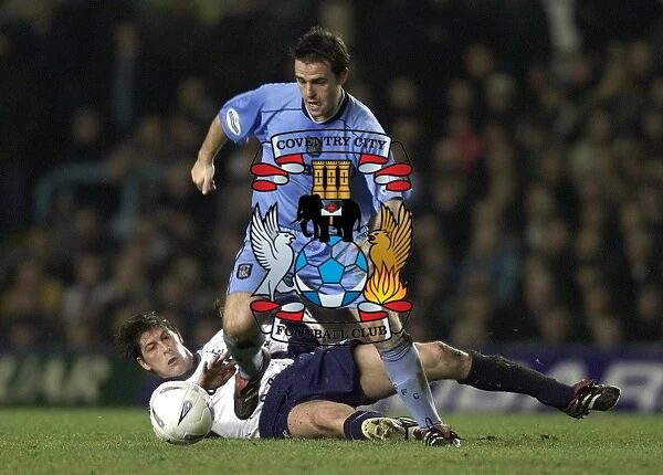 David Thompson Escapes Challenge from Darren Anderton in Coventry City's FA Cup Clash against Tottenham Hotspur (01-2002)