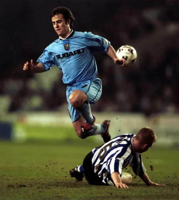 Framed Print : David Thompson vs. David Burrows: Intense Tackle in Coventry City's Clash with Sheffield Wednesday (Nationwide League Division One, 29-03-2002) Framed Print : David Thompson vs. David Burrows: Intense Tackle in Coventry City's Clash with Sheffield Wednesday (Nationwide League Division One, 29-03-2002)