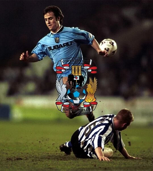David Thompson vs. David Burrows: Intense Tackle in Coventry City's Clash with Sheffield Wednesday (Nationwide League Division One, 29-03-2002)