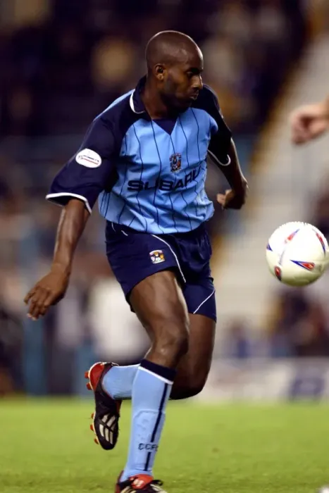Framed Print : Determined Dele Adebola: Coventry City's Battle Against Nottingham Forest (2003) Framed Print : Determined Dele Adebola: Coventry City's Battle Against Nottingham Forest (2003)