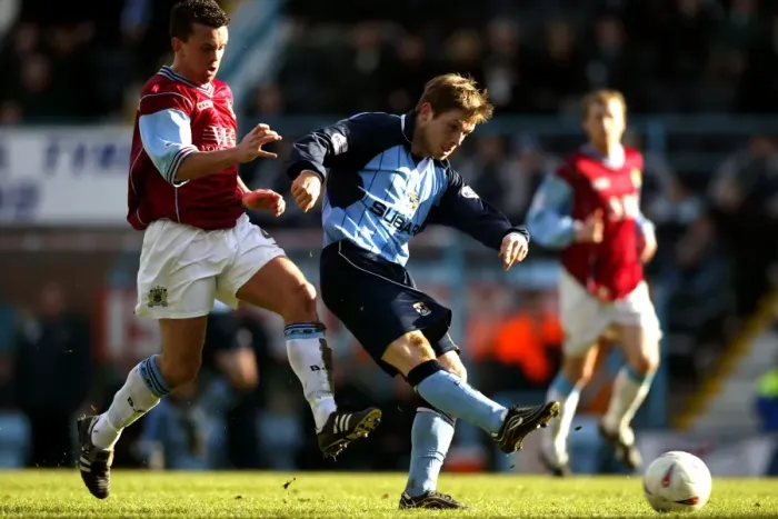 Framed Print : Determined Duel: Gudjohnsson's Defiant Shot vs. Weller's Pressure (Coventry City vs Burnley, Nationwide League Division One, 13-03-2004) Framed Print : Determined Duel: Gudjohnsson's Defiant Shot vs. Weller's Pressure (Coventry City vs Burnley, Nationwide League Division One, 13-03-2004)