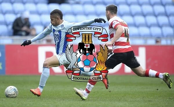Determined Simeon Jackson: Coventry City's Brilliant Shot Amidst Doncaster Rovers Defensive Pressure (Sky Bet League One)