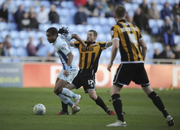 Framed Print : Dominic Samuel vs Michael Brown: A Fiery Rivalry Unfolds in Coventry City's Sky Bet League One Clash against Port Vale Framed Print : Dominic Samuel vs Michael Brown: A Fiery Rivalry Unfolds in Coventry City's Sky Bet League One Clash against Port Vale