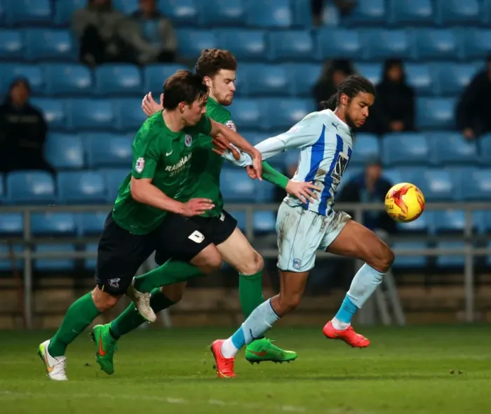 Framed Print : Dominic Samuel vs Niall Canavan: A Battle in Sky Bet League One - Coventry City vs Scunthorpe United Framed Print : Dominic Samuel vs Niall Canavan: A Battle in Sky Bet League One - Coventry City vs Scunthorpe United