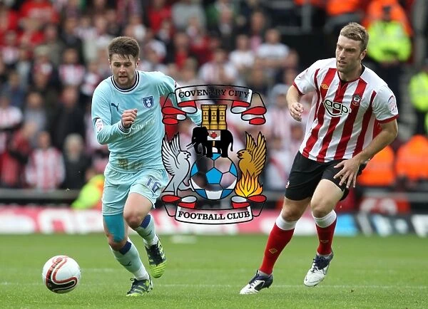Escaping the Pressure: Norwood Evades Lambert in Coventry City vs Southampton Clash