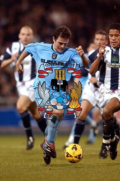 A Fierce Face-Off: David Thompson vs. West Bromwich Albion - Coventry City's Intense Division One Clash (December 12, 2001)