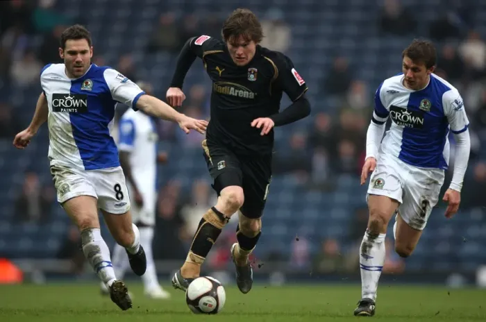 Framed Print : Fifth Round FA Cup Clash: Aron Gunnarsson of Coventry City vs. Blackburn Rovers David Dunn and Stephen Warnock (2009) Framed Print : Fifth Round FA Cup Clash: Aron Gunnarsson of Coventry City vs. Blackburn Rovers David Dunn and Stephen Warnock (2009)