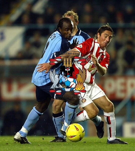 A Fight for Supremacy: Coventry City vs. Sunderland - Intense Rivalry on the Division One Field: Patrick Suffo vs. Tommy Smith